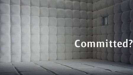 No tasteless jokes about involuntary commitment here. Move along. Padded cell that says 'Committed?'